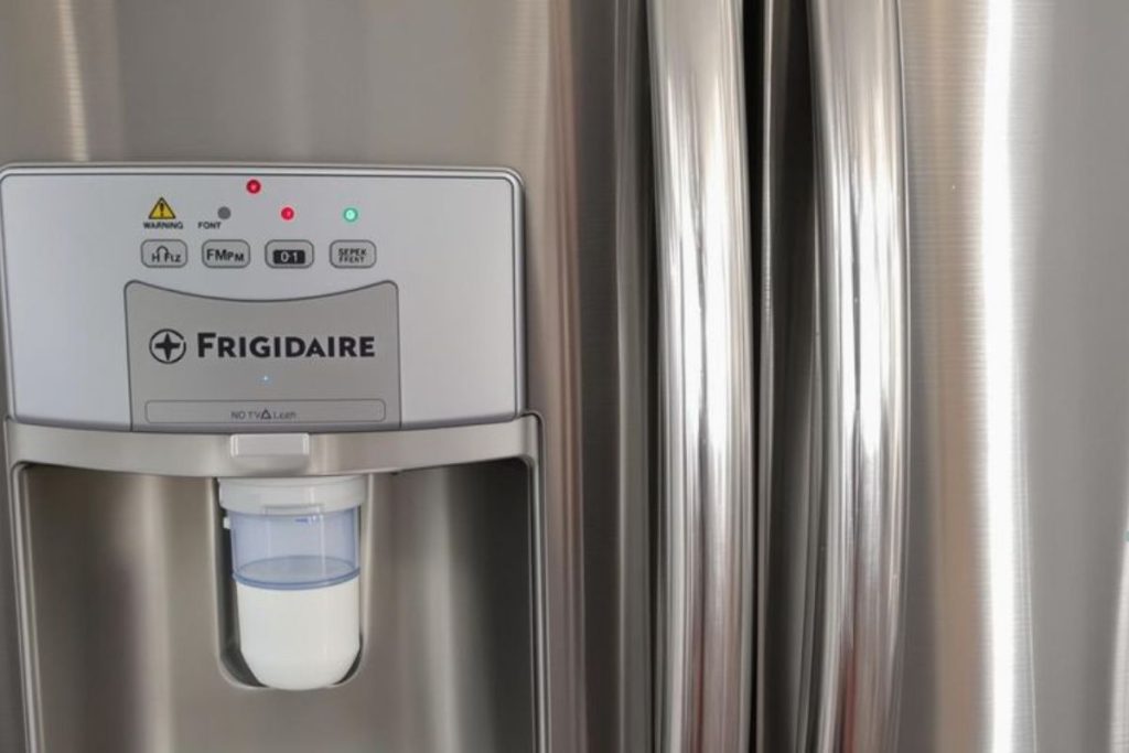 A refrigerator featuring a water dispenser, highlighting its functionality for an appliance repair service advertisement.